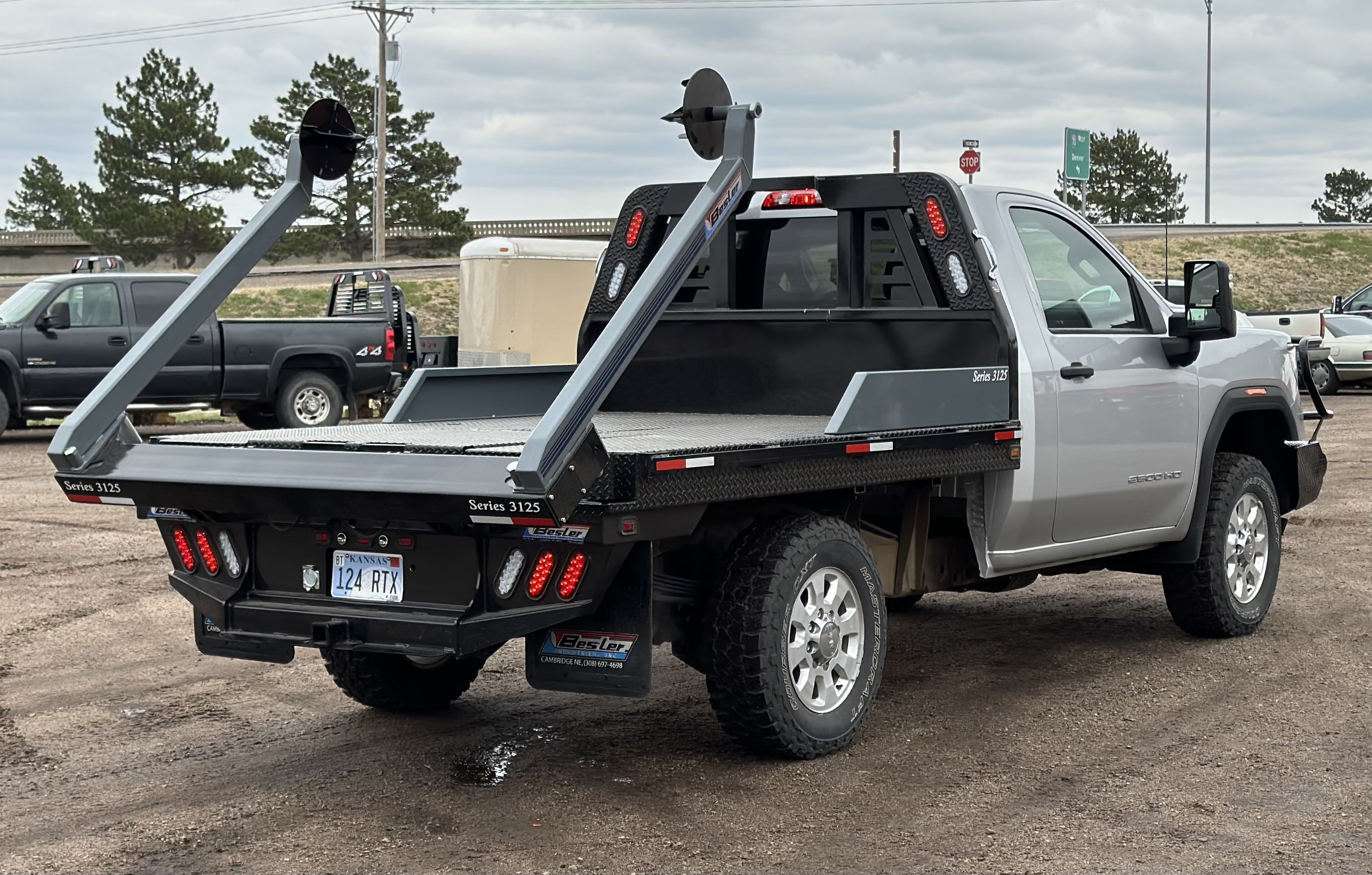 Bale bed outlet tool box